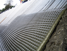 Incomat® Standard Betonmatte als Kanalwandabdeckung Kanalwand mit Incomat® Standard Betonmatte bedeckt